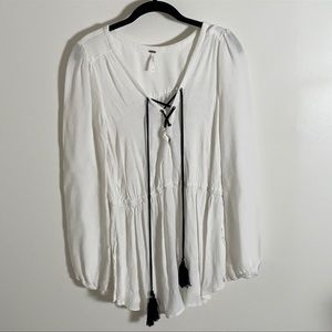 White Free people tunic with black tassels size S